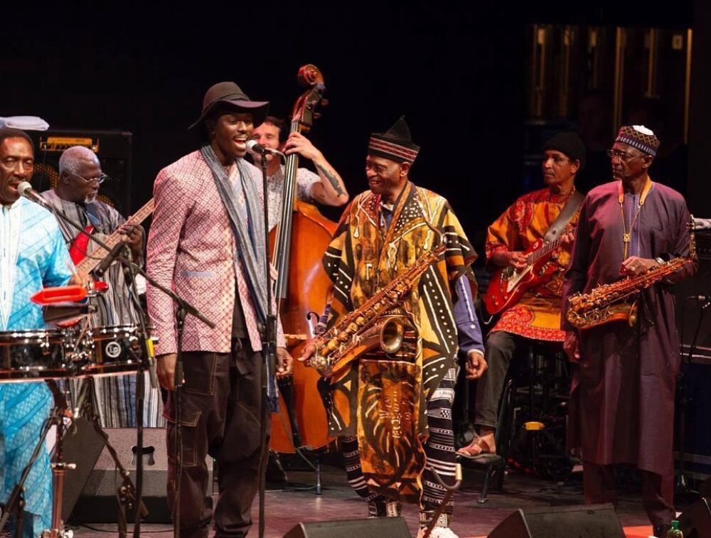 With Orchestra Baobab